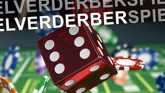 Ein Würfel und Jetons werden geworfen